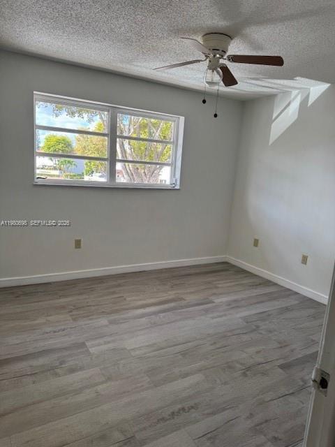 13404 Southwest 62nd Street, Unit 101L Miami, FL 33183 - Photo 19 of 46 a view of an empty room with a window
