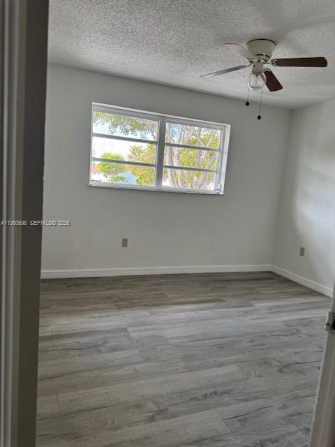 13404 Southwest 62nd Street, Unit 101L Miami, FL 33183 - Photo 27 of 46 a view of an empty room with a window