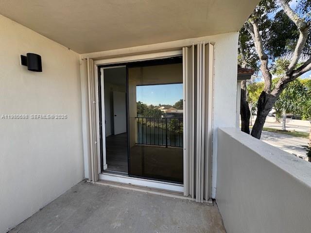 13404 Southwest 62nd Street, Unit 101L Miami, FL 33183 - Photo 36 of 46 a view of a front door and a window