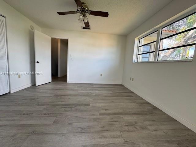 13404 Southwest 62nd Street, Unit 101L Miami, FL 33183 - Photo 37 of 46 a view of an empty room with a window