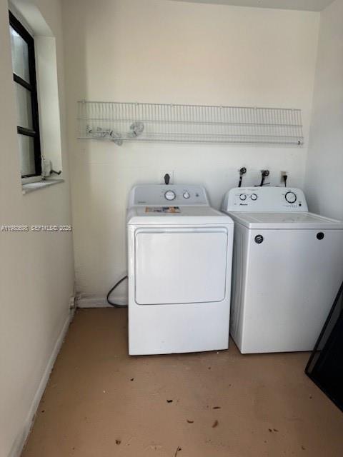 13404 Southwest 62nd Street, Unit 101L Miami, FL 33183 - Photo 5 of 46 a utility room with dryer and washer