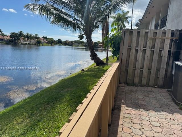 13404 Southwest 62nd Street, Unit 101L Miami, FL 33183 - Photo 6 of 46 a view of a garden with lake