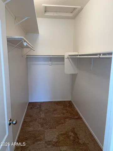 a view of a room with racks on the wall