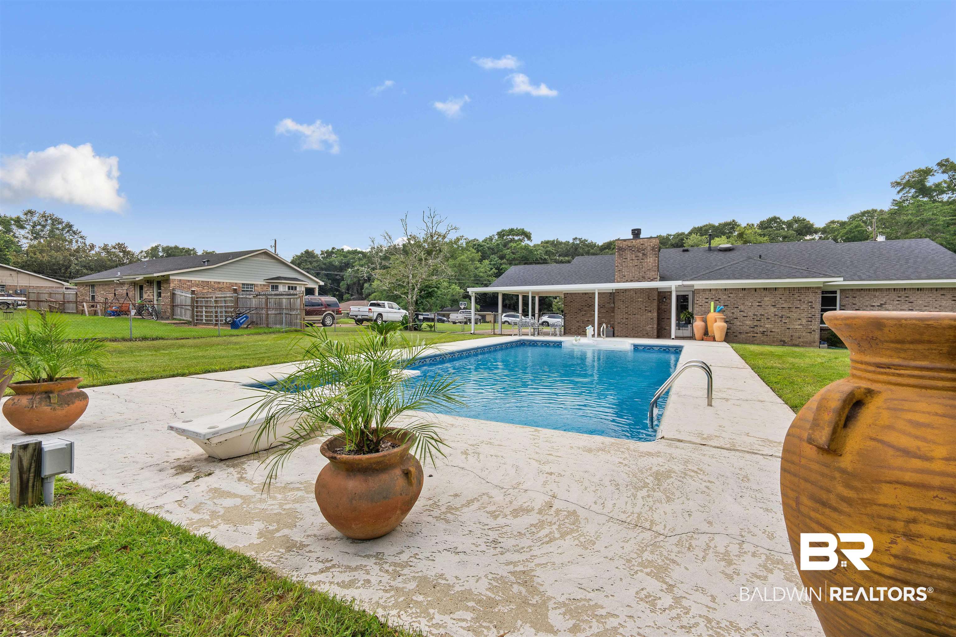 2000 Campfire Drive Semmes, AL 36575 - Photo 23 of 26 View of swimming pool with a yard and a patio area