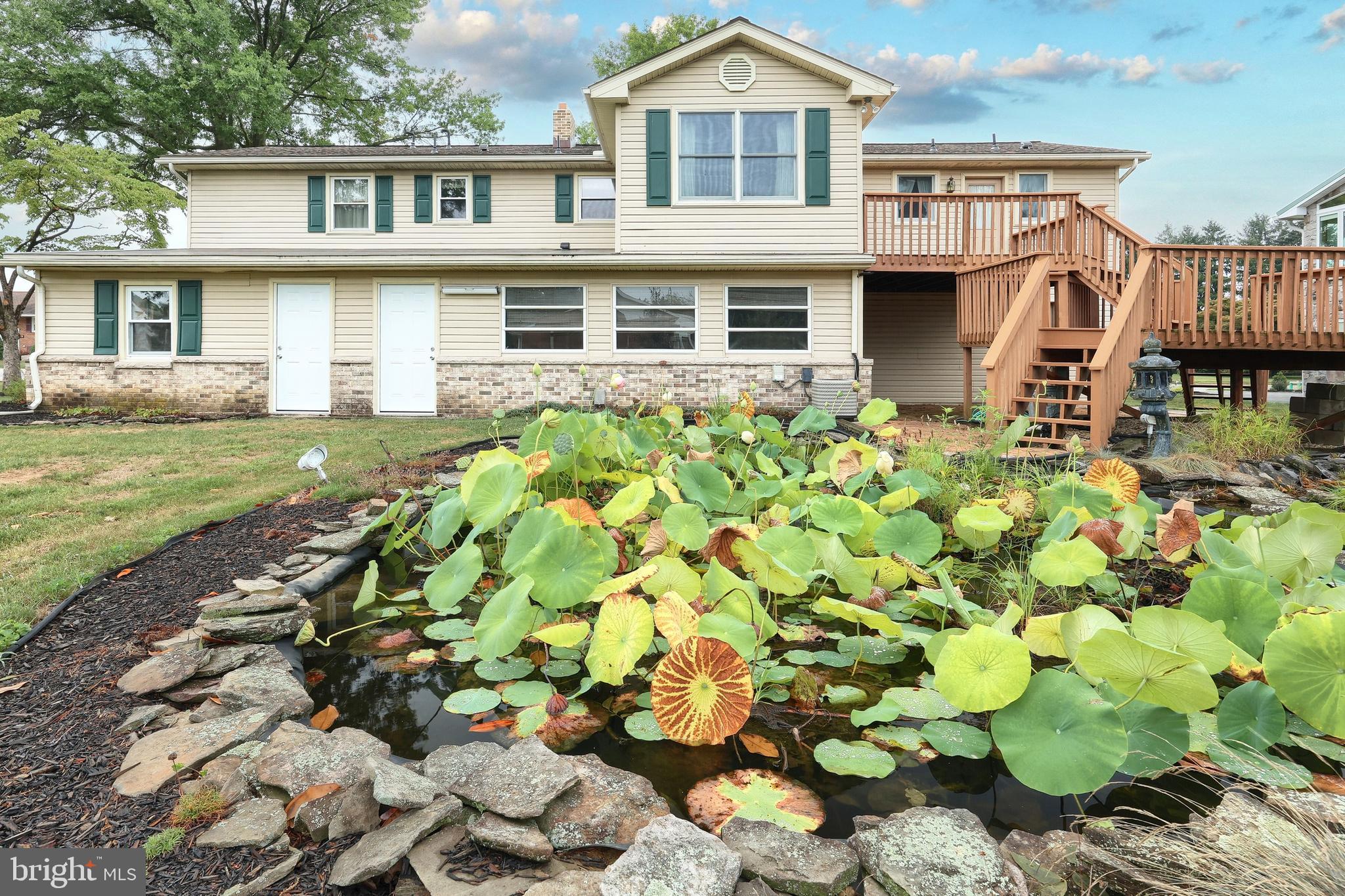 406 Spring Forge Drive Spring Grove, PA 17362 - Photo 11 of 53 a front view of a house with a yard