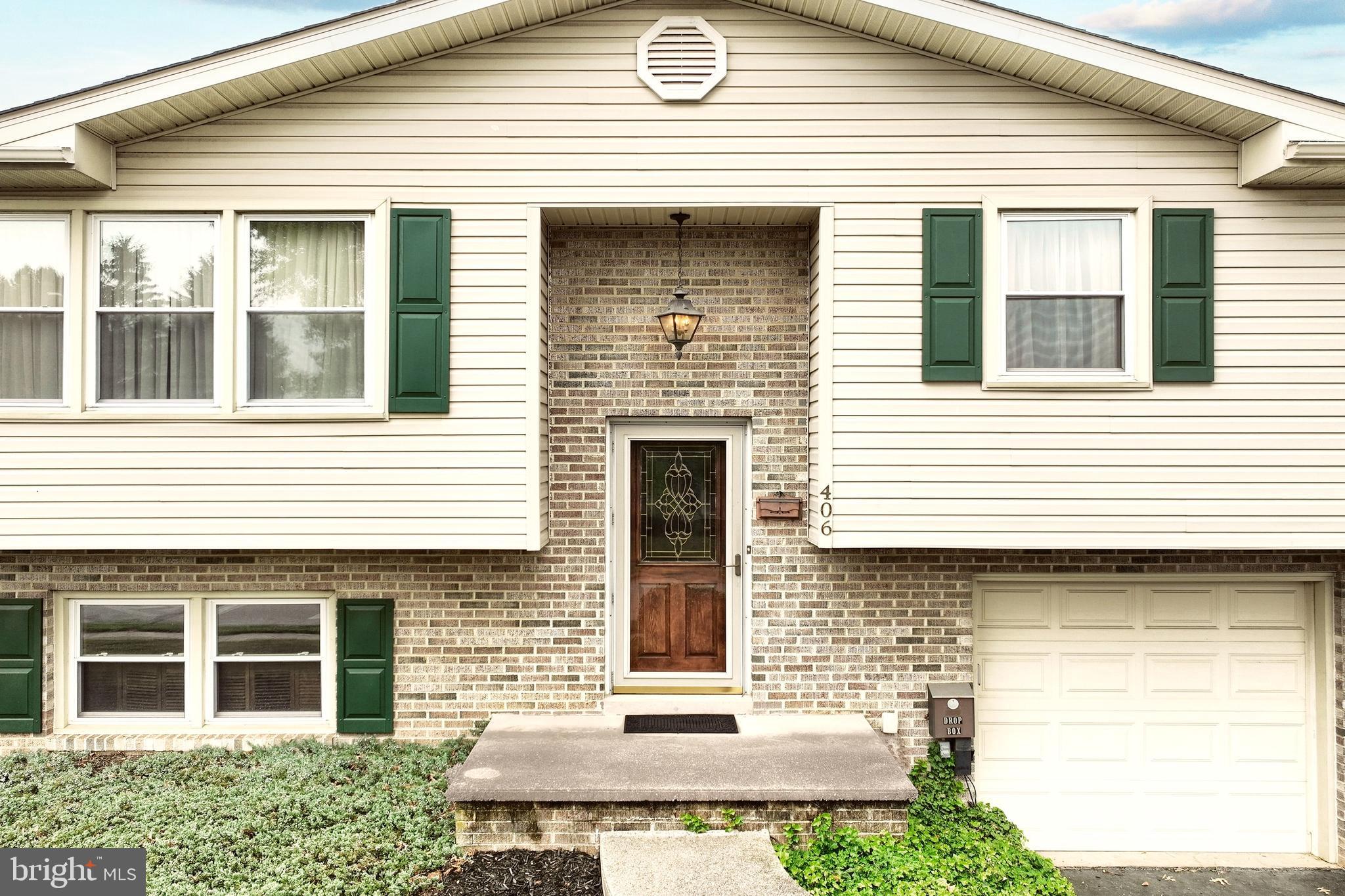 406 Spring Forge Drive Spring Grove, PA 17362 - Photo 14 of 53 a front view of a house with garage