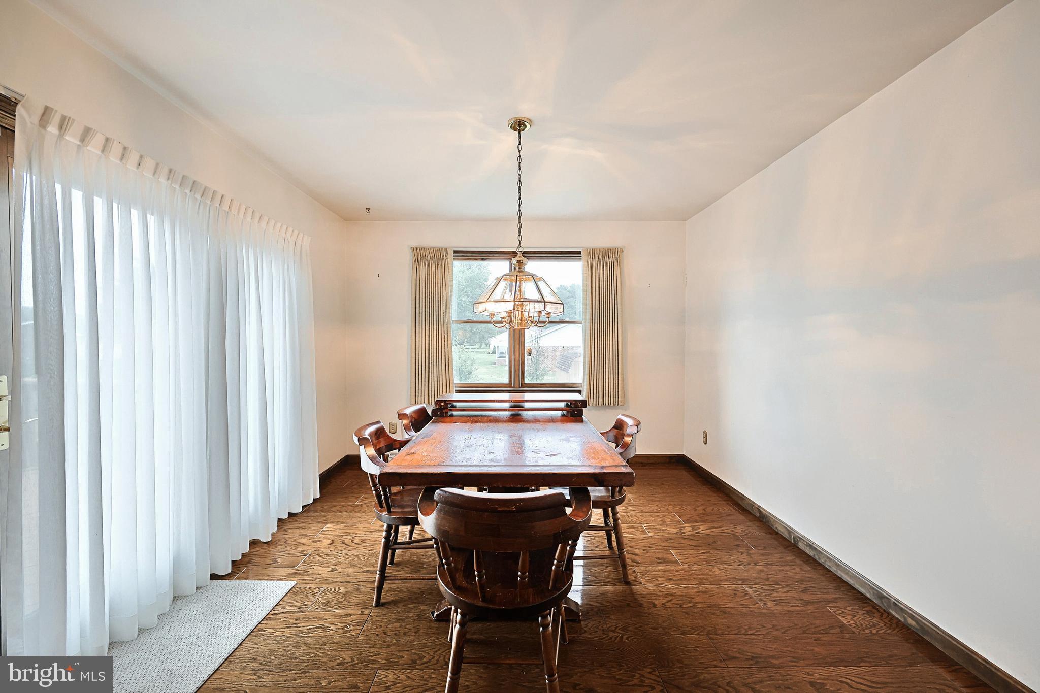 406 Spring Forge Drive Spring Grove, PA 17362 - Photo 18 of 53 a dining room with furniture and window