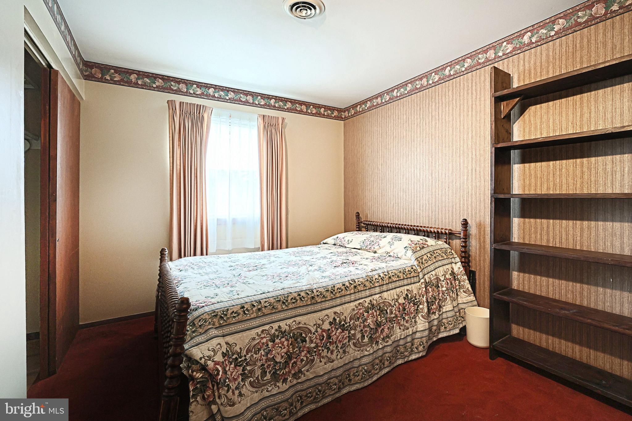 406 Spring Forge Drive Spring Grove, PA 17362 - Photo 26 of 53 a bedroom with a bed and a window