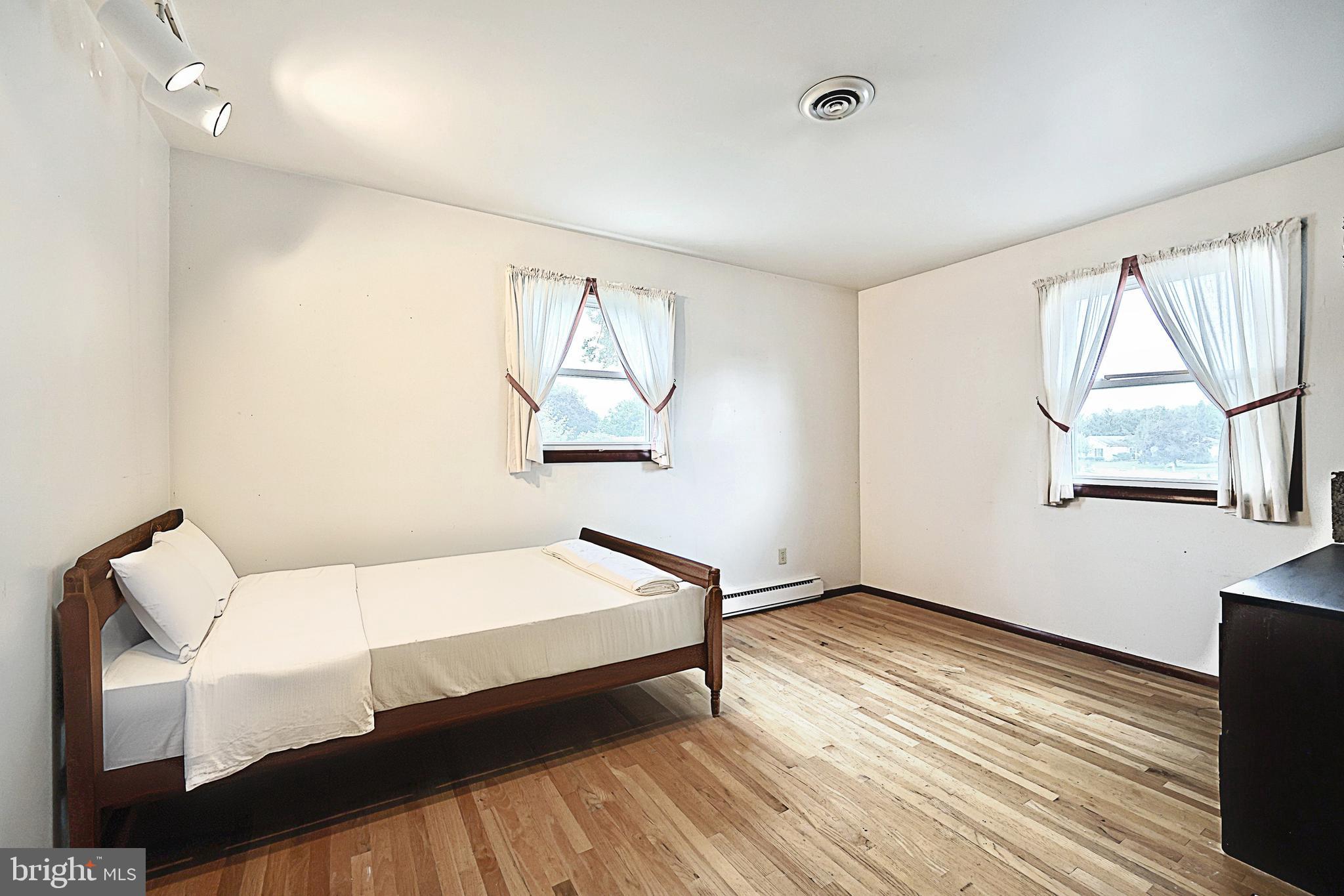 406 Spring Forge Drive Spring Grove, PA 17362 - Photo 27 of 53 a bedroom with a bed and window