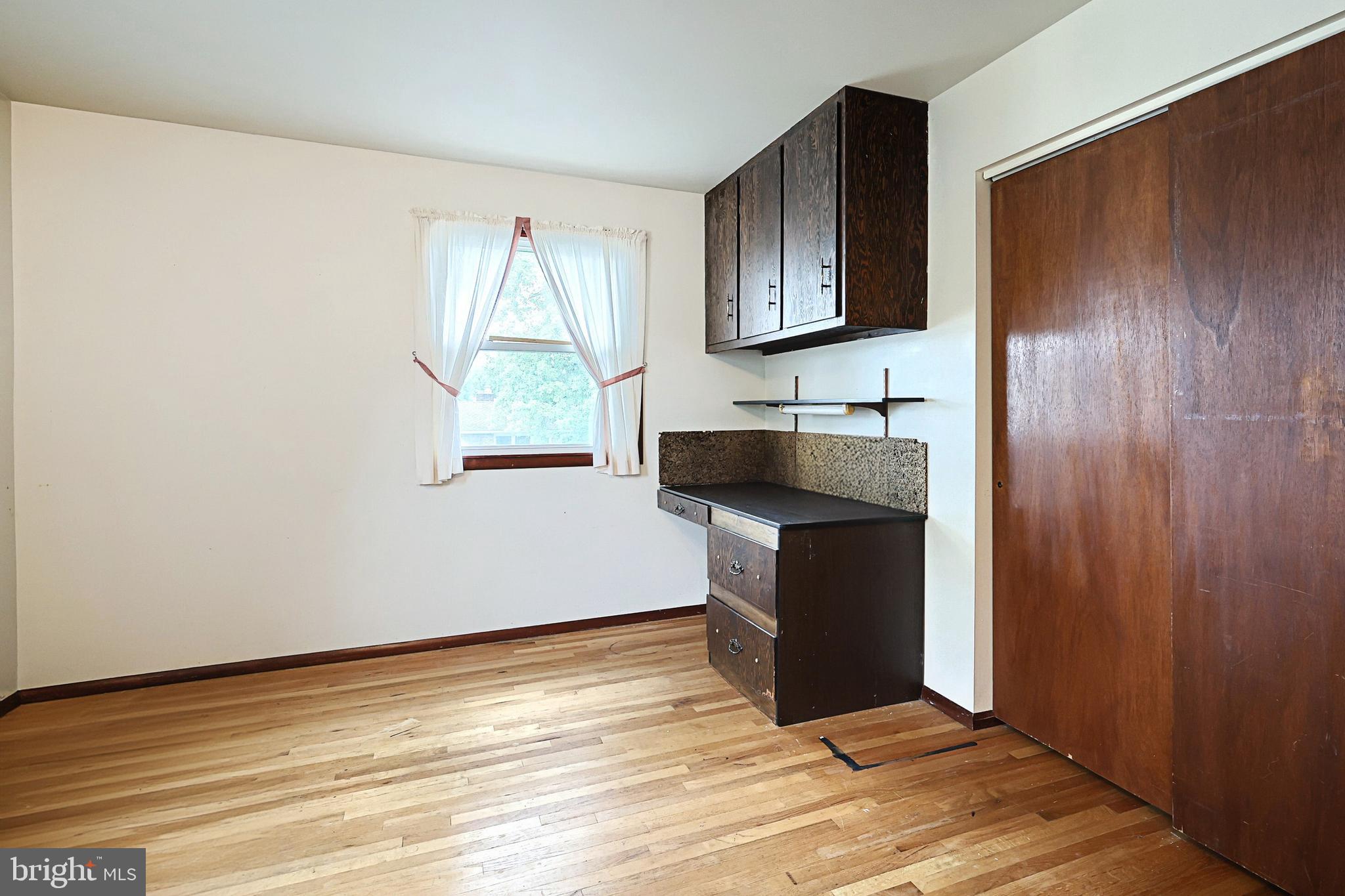 406 Spring Forge Drive Spring Grove, PA 17362 - Photo 28 of 53 a view of a kitchen with wooden floor and cabinet