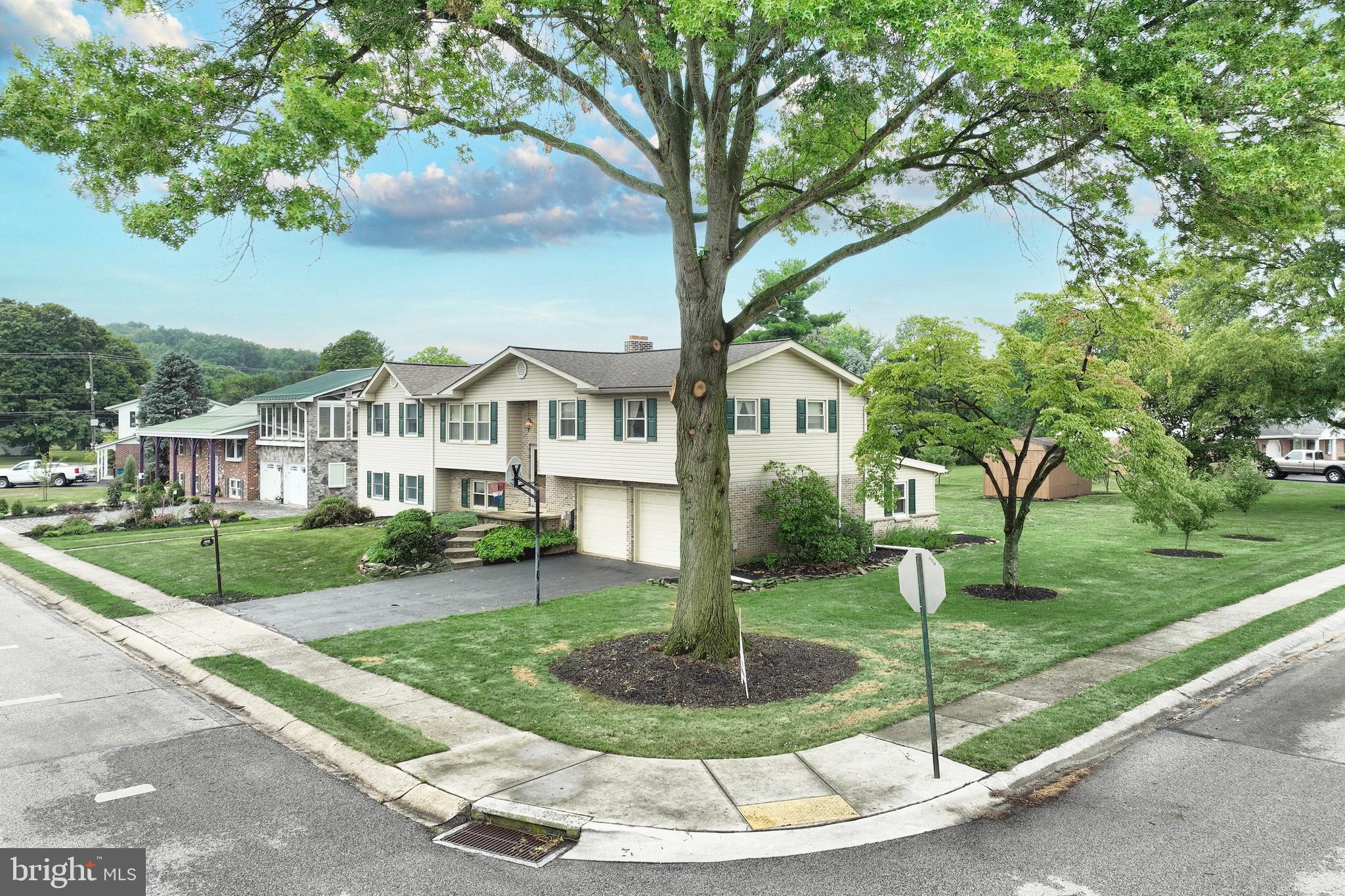 406 Spring Forge Drive Spring Grove, PA 17362 - Photo 4 of 53 a front view of a house with a yard