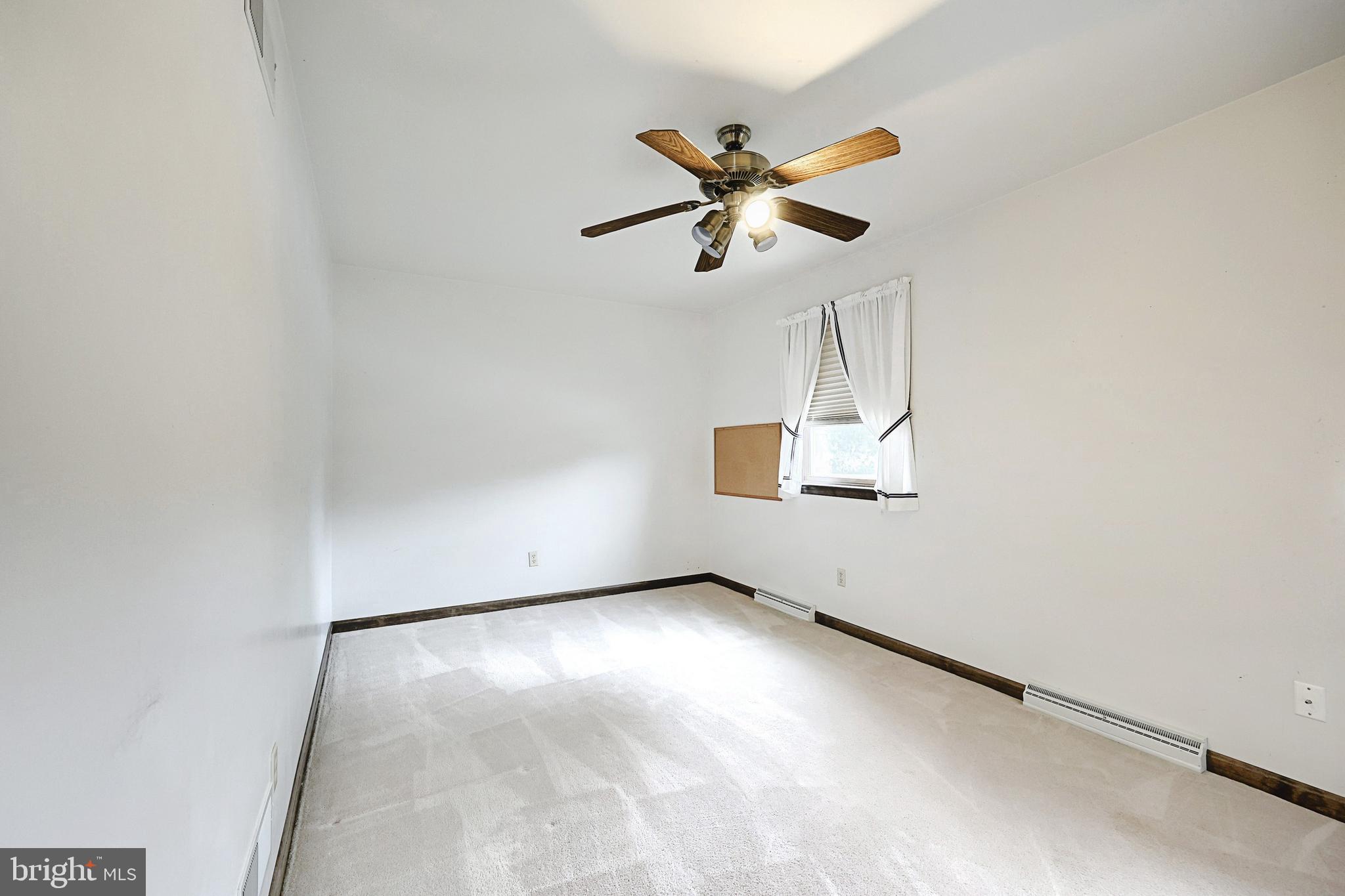 406 Spring Forge Drive Spring Grove, PA 17362 - Photo 43 of 53 a view of a room with a fan and wooden floor