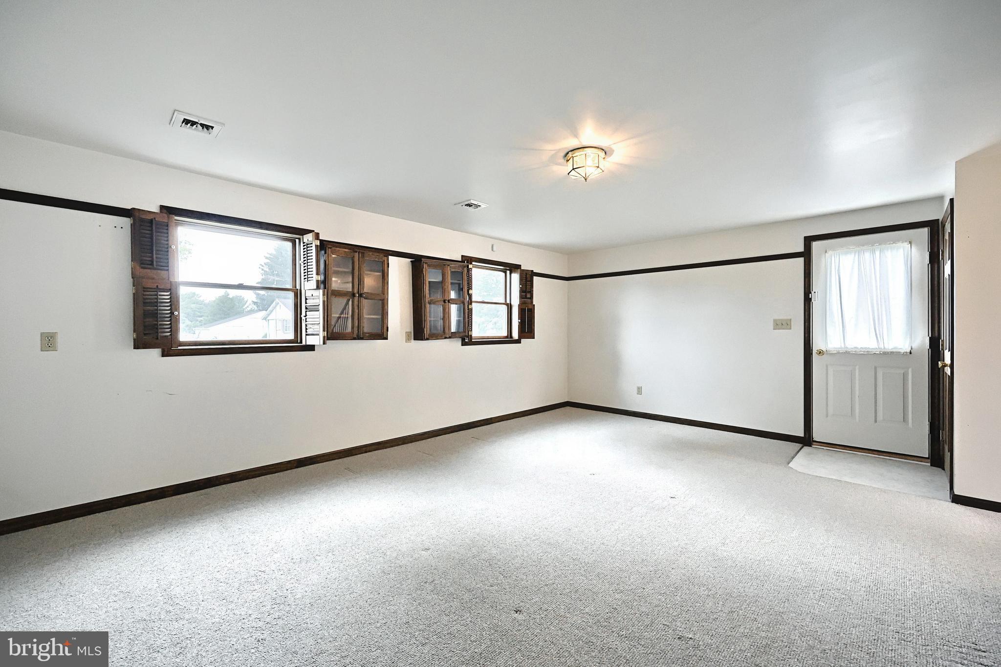 406 Spring Forge Drive Spring Grove, PA 17362 - Photo 44 of 53 an empty room with windows