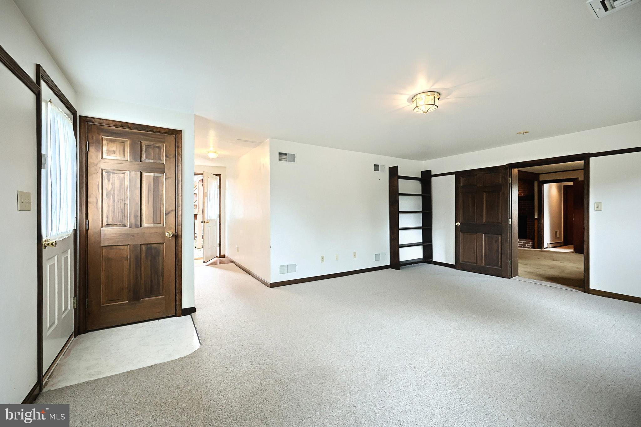 406 Spring Forge Drive Spring Grove, PA 17362 - Photo 45 of 53 an empty room with closet and windows