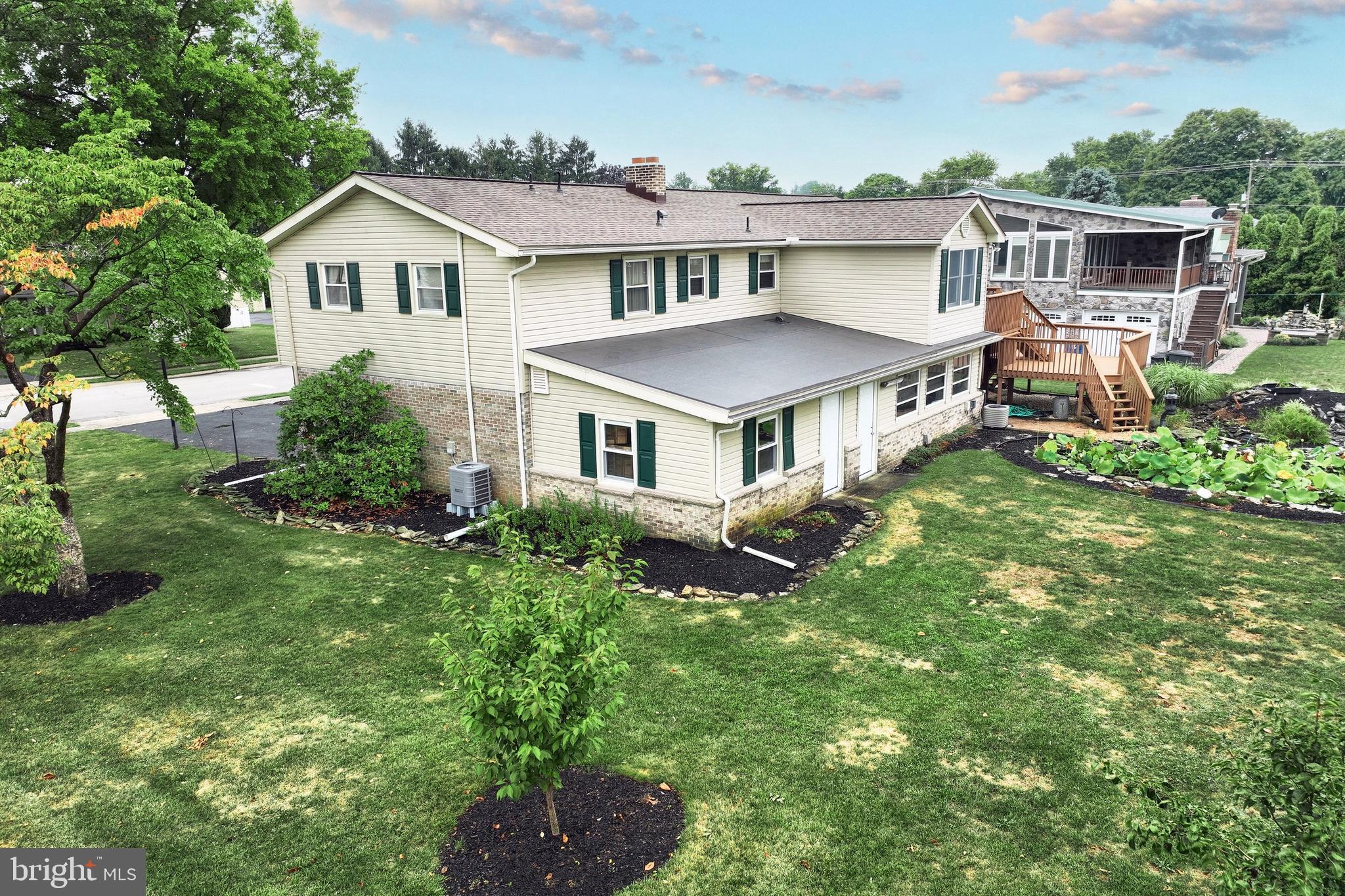 406 Spring Forge Drive Spring Grove, PA 17362 - Photo 8 of 53 a aerial view of a house with yard and green space