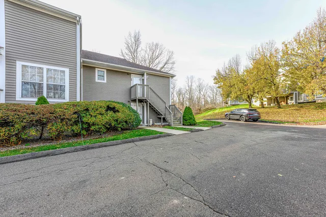 a house view with a garden space