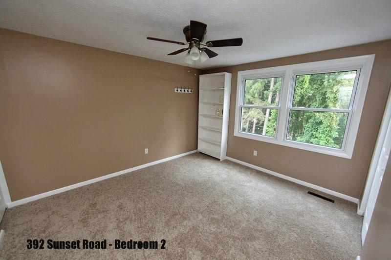 390-392 Sunset Road Pittsburgh, PA 15237 - Photo 14 of 25 a view of a room with a ceiling fan and window