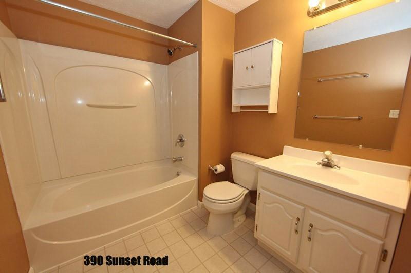 390-392 Sunset Road Pittsburgh, PA 15237 - Photo 20 of 25 a bathroom with a sink a toilet and shower