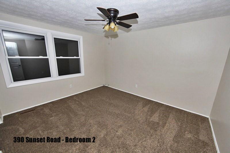 390-392 Sunset Road Pittsburgh, PA 15237 - Photo 23 of 25 a view of an empty room with a window