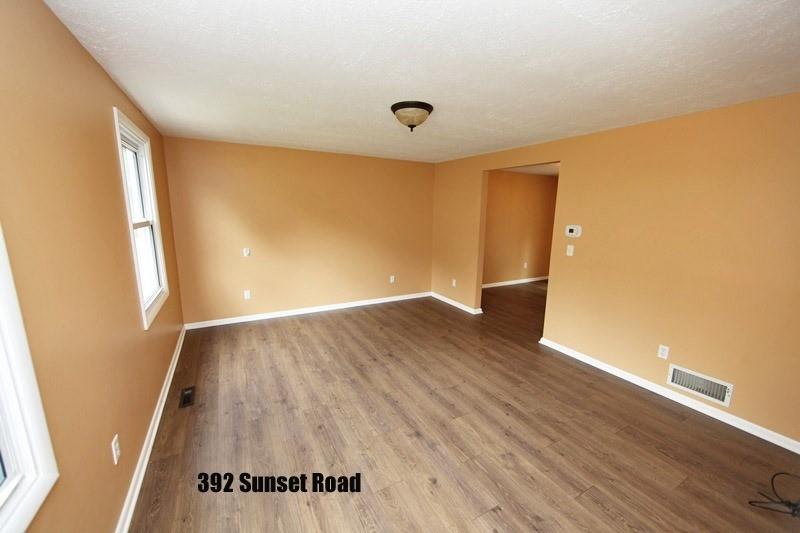 390-392 Sunset Road Pittsburgh, PA 15237 - Photo 3 of 25 wooden floor in an empty room with a window