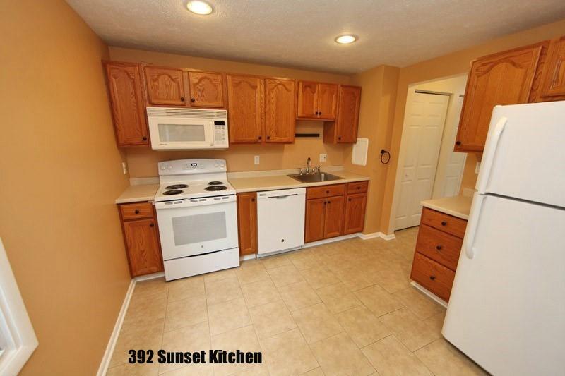 390-392 Sunset Road Pittsburgh, PA 15237 - Photo 7 of 25 a kitchen with stainless steel appliances a stove a sink and a refrigerator