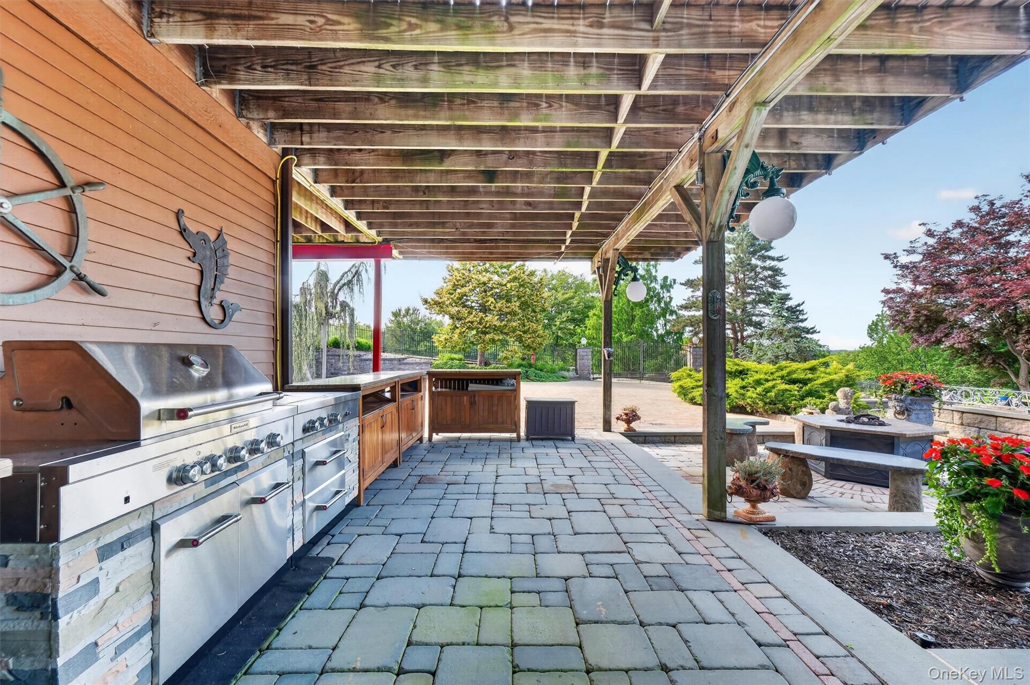 165 Hasbrouck Road Goshen, NY 10924 - Photo 10 of 50 Hosting a pool party is a breeze with the expansive outdoor cookout space