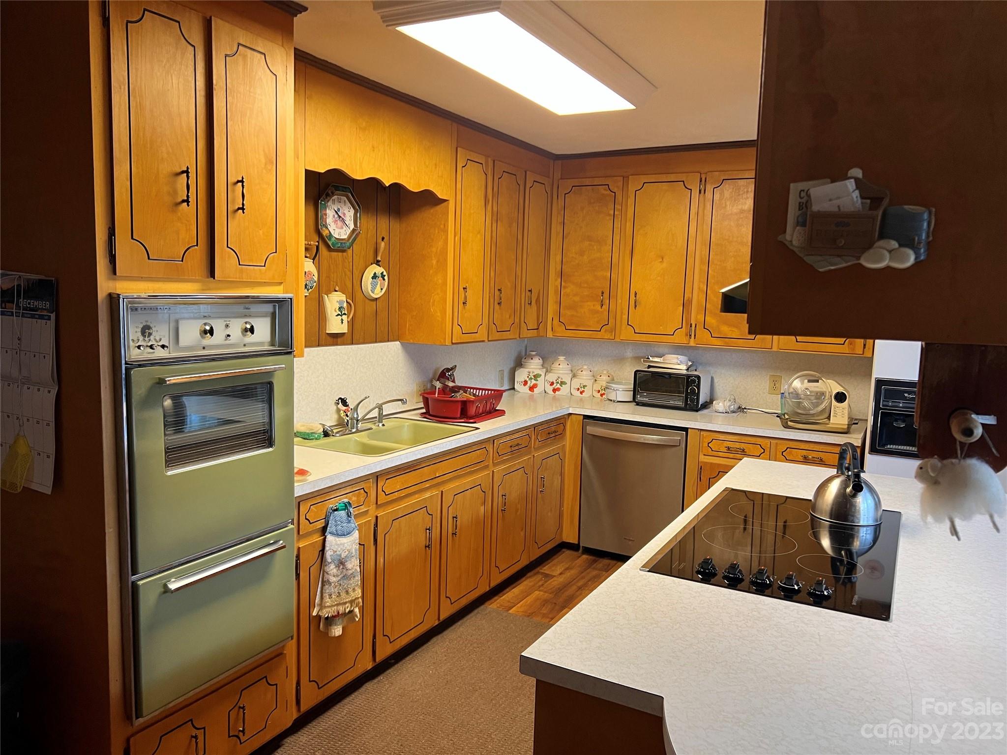 682 Summers Road Valdese, NC 28690 - Photo 11 of 45 a kitchen with a sink appliances and cabinets