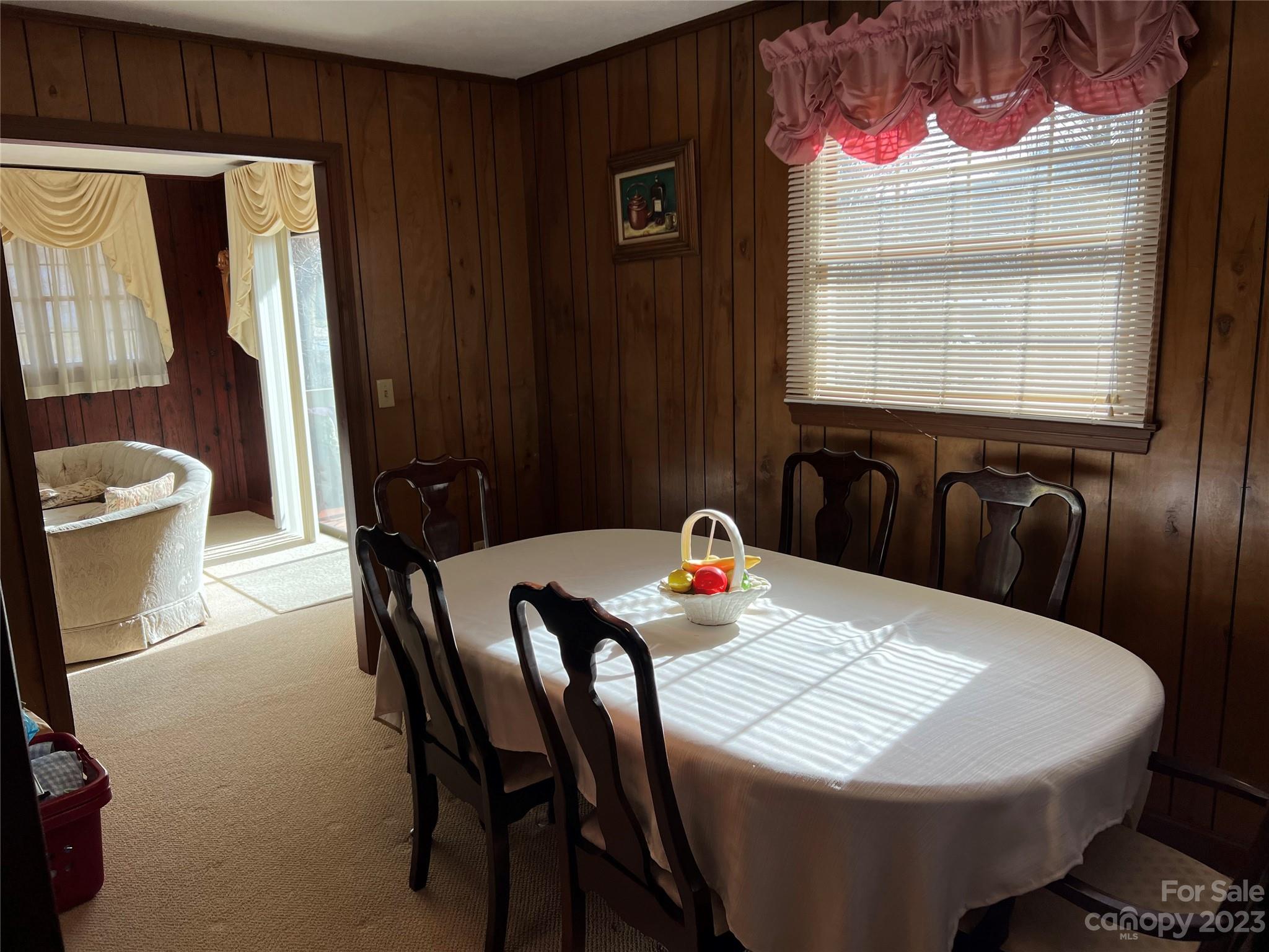 682 Summers Road Valdese, NC 28690 - Photo 14 of 45 a view of a dining room with furniture and window