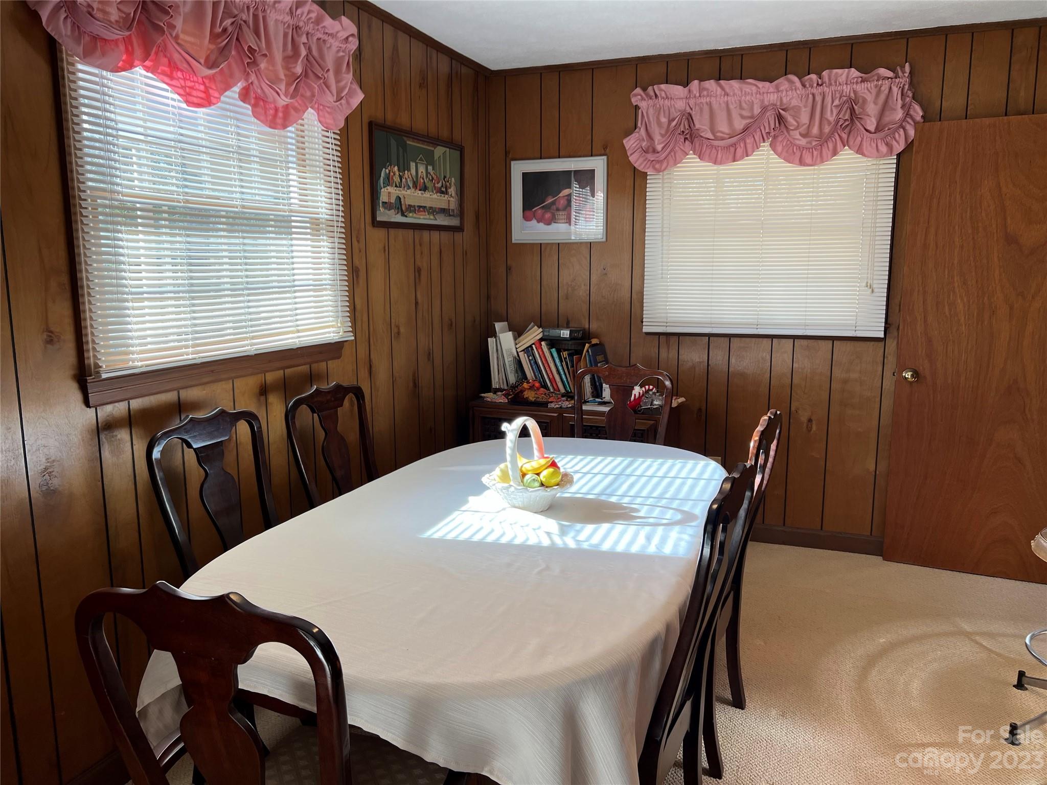 682 Summers Road Valdese, NC 28690 - Photo 15 of 45 a view of a dining room with furniture