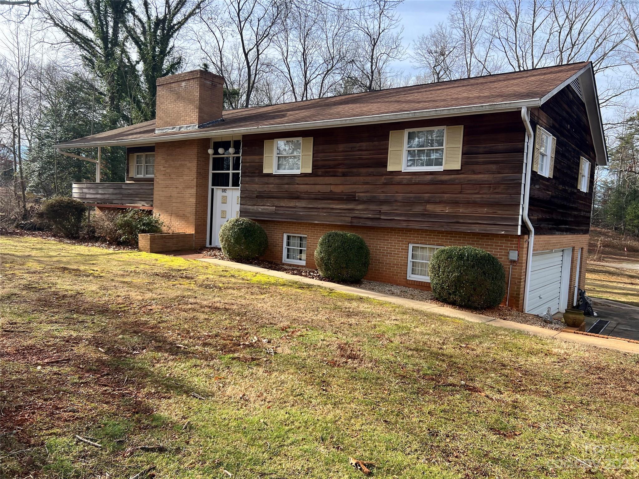 682 Summers Road Valdese, NC 28690 - Photo 2 of 45 a view of a house with a yard