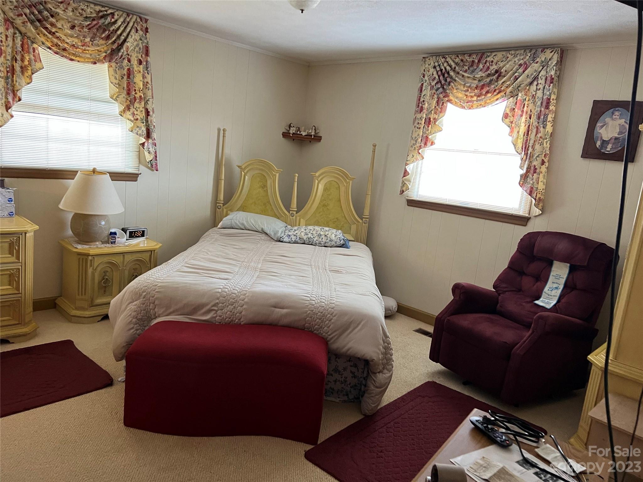 682 Summers Road Valdese, NC 28690 - Photo 25 of 45 a bedroom with a bed chair and window