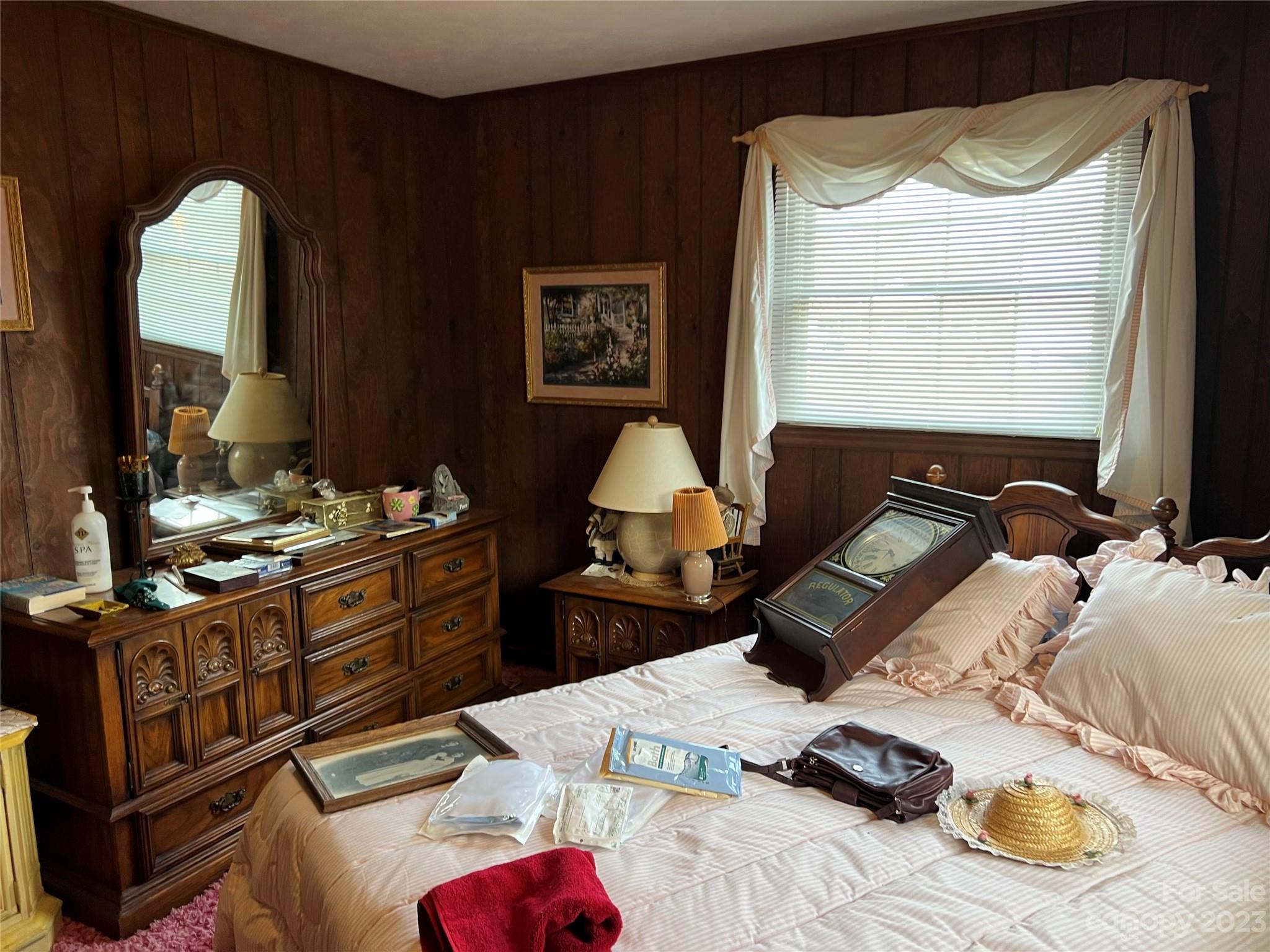 682 Summers Road Valdese, NC 28690 - Photo 27 of 45 a bed sitting in a bedroom next to a window