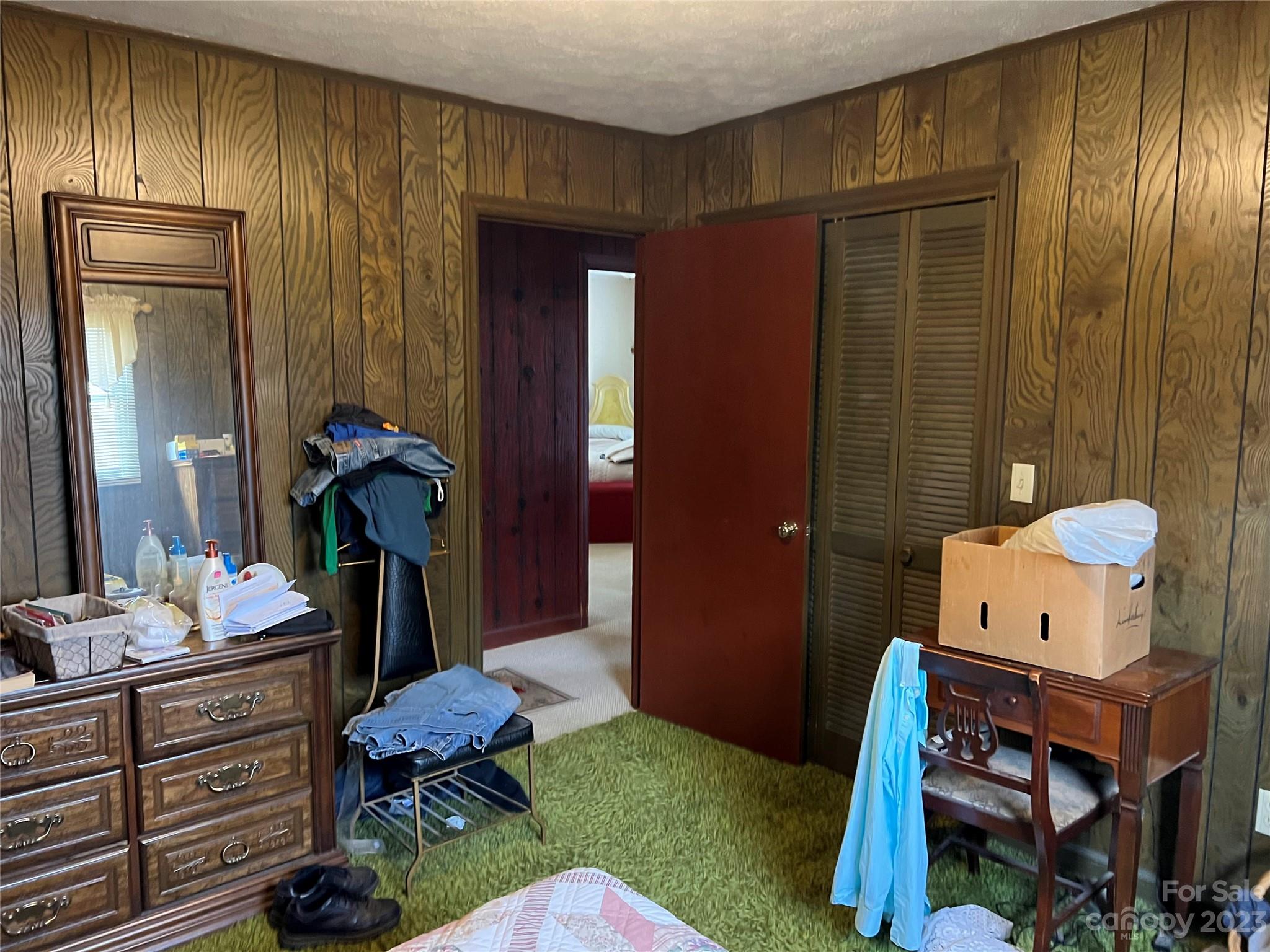682 Summers Road Valdese, NC 28690 - Photo 29 of 45 a room with furniture and wooden floor
