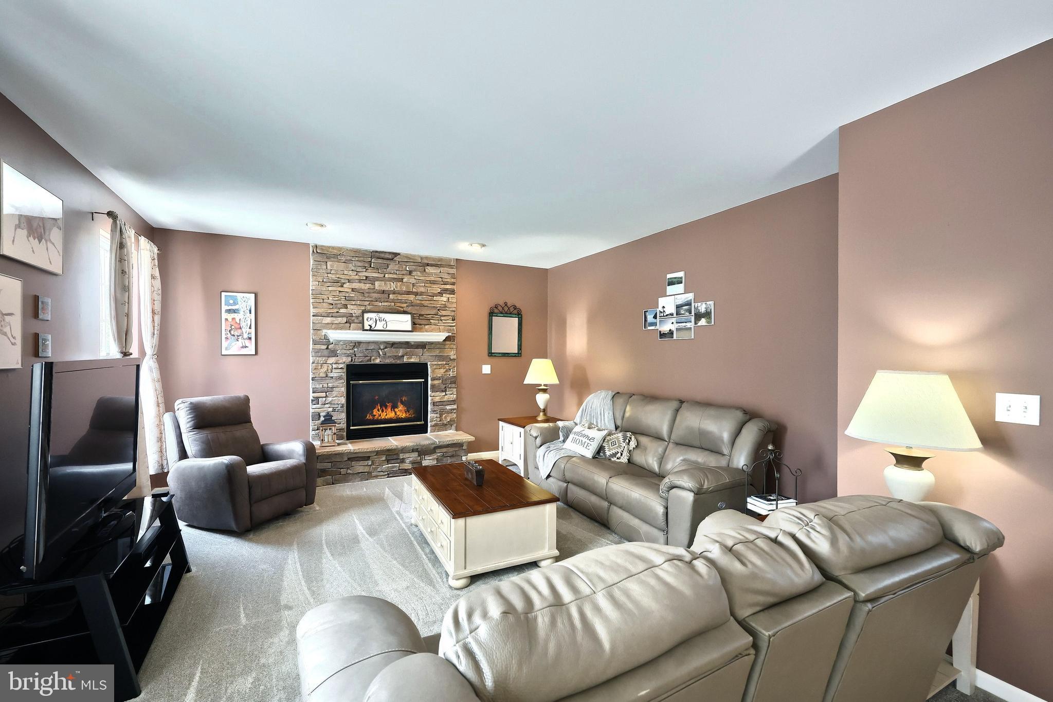 44 Smith Mill Road New Freedom, PA 17349 - Photo 20 of 51 a living room with furniture and a fireplace
