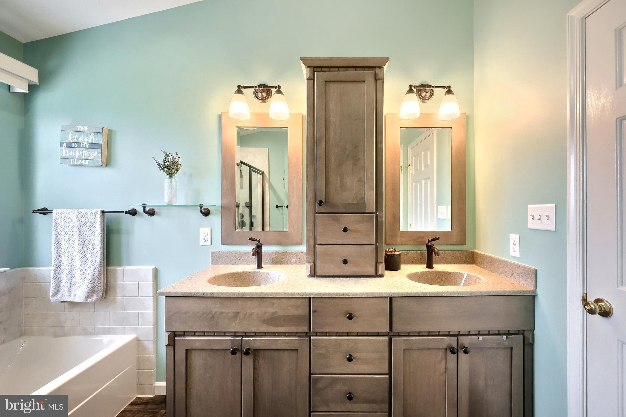 44 Smith Mill Road New Freedom, PA 17349 - Photo 29 of 51 a bathroom with a double vanity sink and a mirror