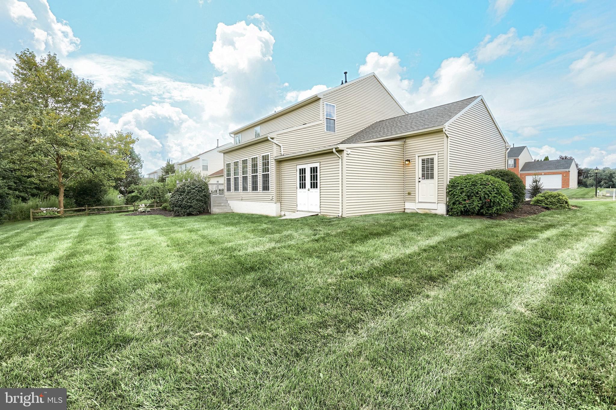 44 Smith Mill Road New Freedom, PA 17349 - Photo 39 of 51 a view of a house with a yard and potted plants