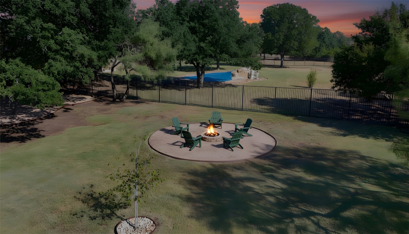 129 Camp Verde Drive Georgetown, TX 78633 - Photo 37 of 39 Yard at dusk featuring a patio and an outdoor fire pit