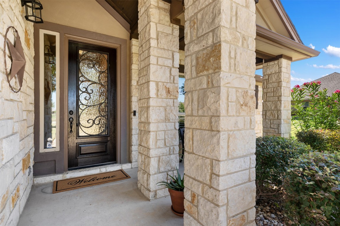 129 Camp Verde Drive Georgetown, TX 78633 - Photo 5 of 39 Property entrance featuring stone siding
