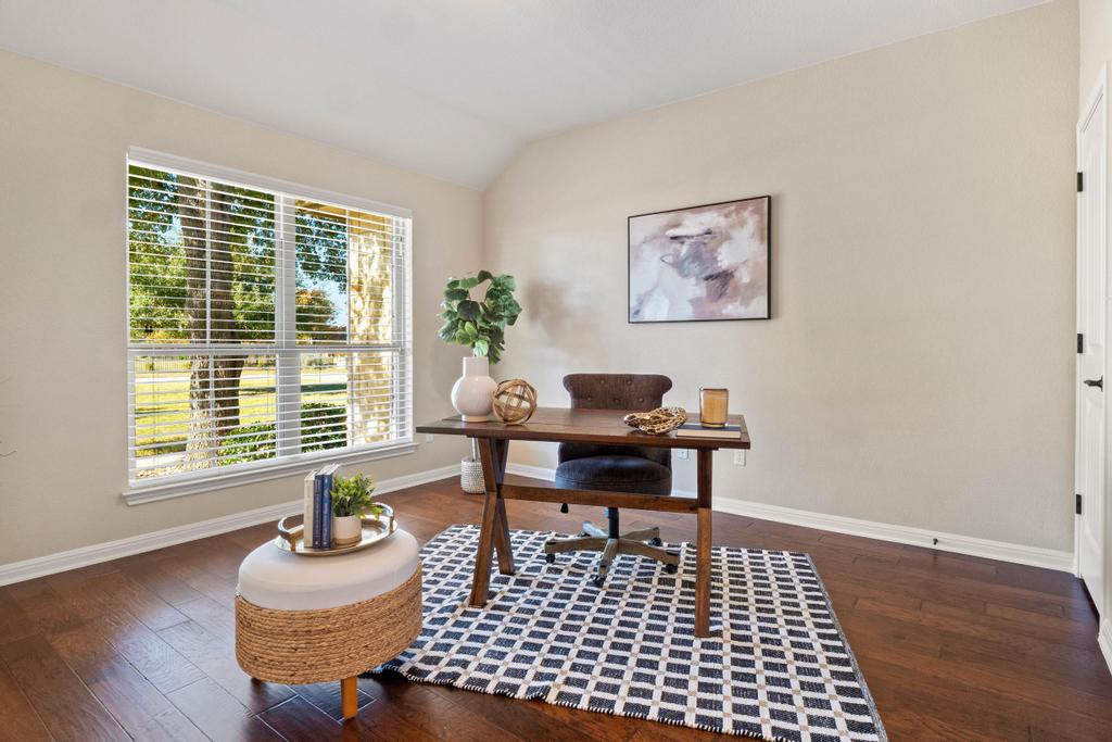 129 Camp Verde Drive Georgetown, TX 78633 - Photo 7 of 39 Home office featuring vaulted ceiling and dark wood-type flooring
