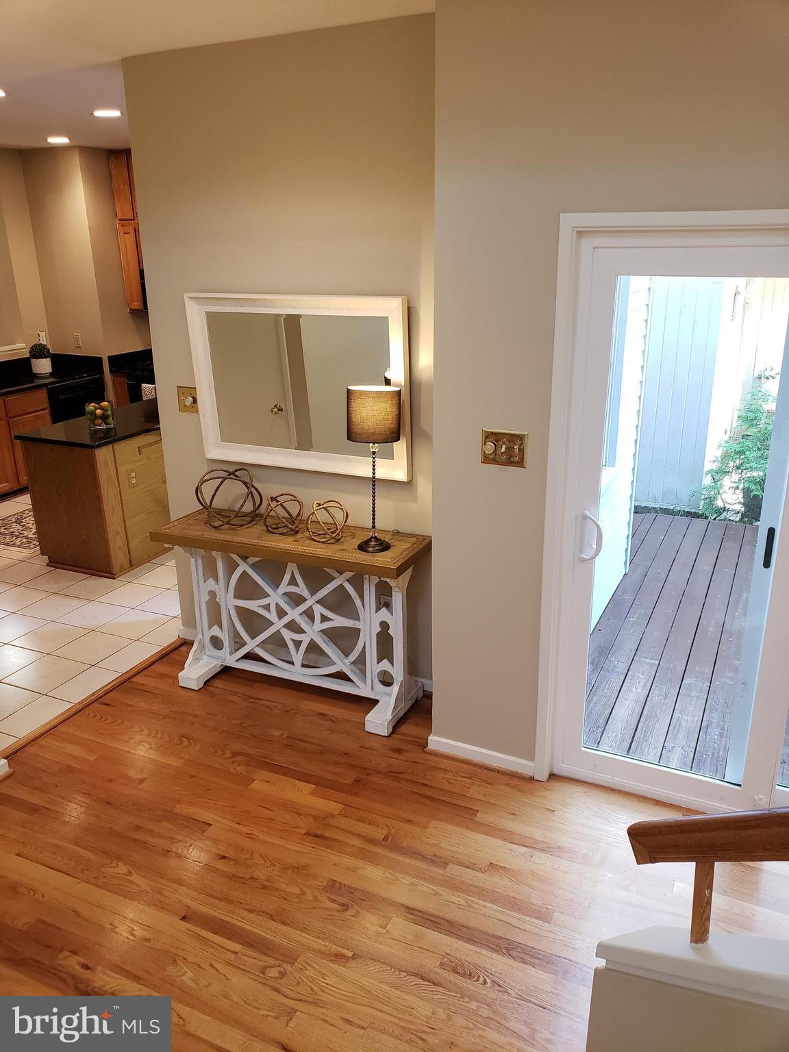 2043 Beacon Place Reston, VA 20191 - Photo 13 of 30 Foyer view to 2nd side Deck