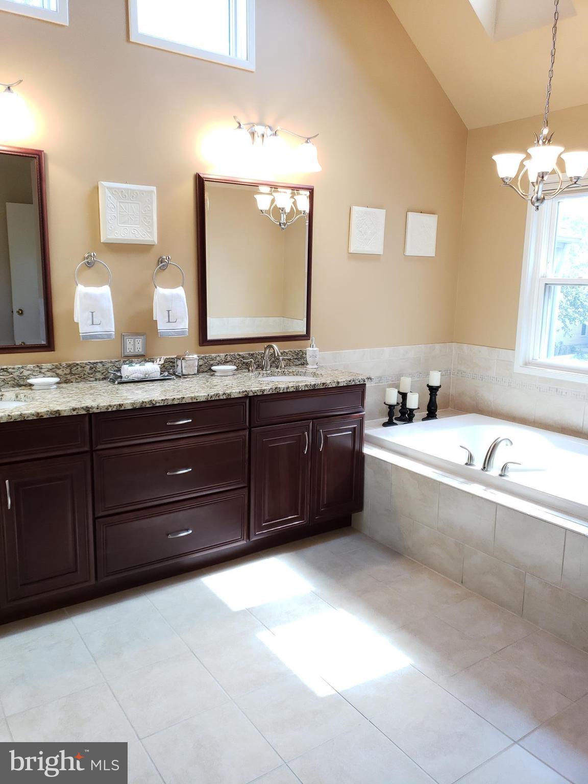 2043 Beacon Place Reston, VA 20191 - Photo 16 of 30 Spacious Master Spa Bath; Cathedral ceilings