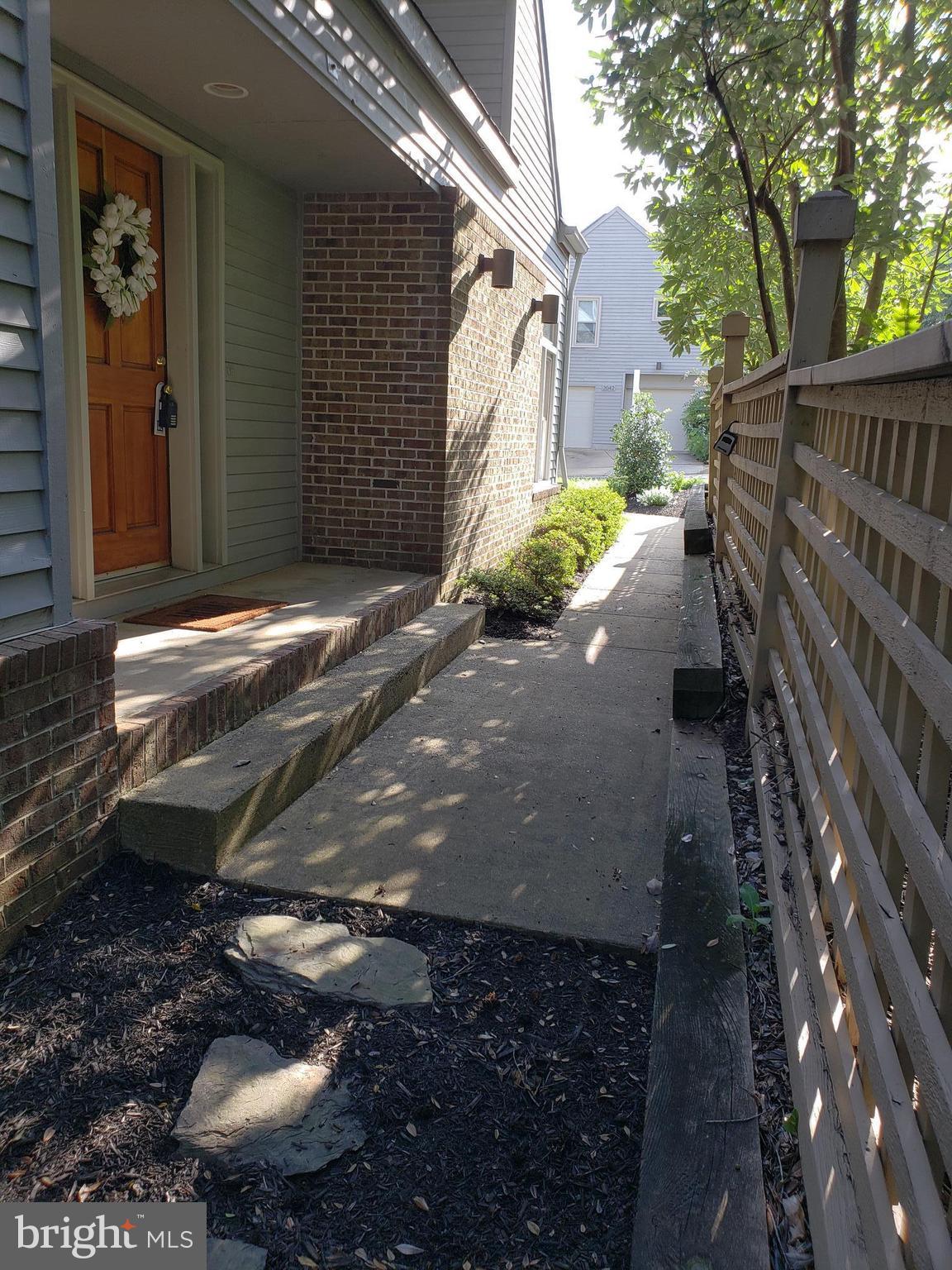 2043 Beacon Place Reston, VA 20191 - Photo 22 of 30 Side Main Entrance view to Street