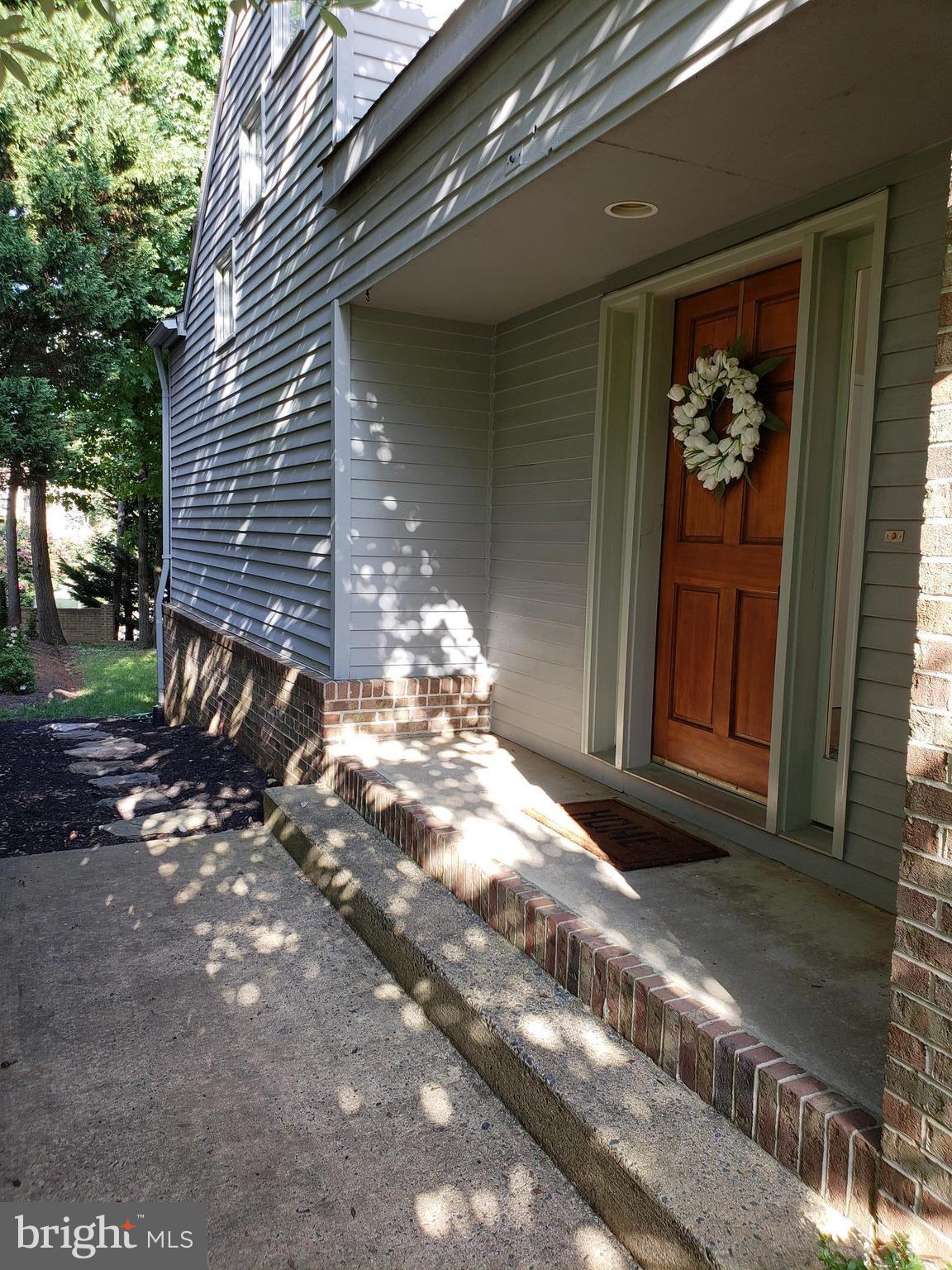 2043 Beacon Place Reston, VA 20191 - Photo 27 of 30 Private Side Entrance with Covered Porch Stoop