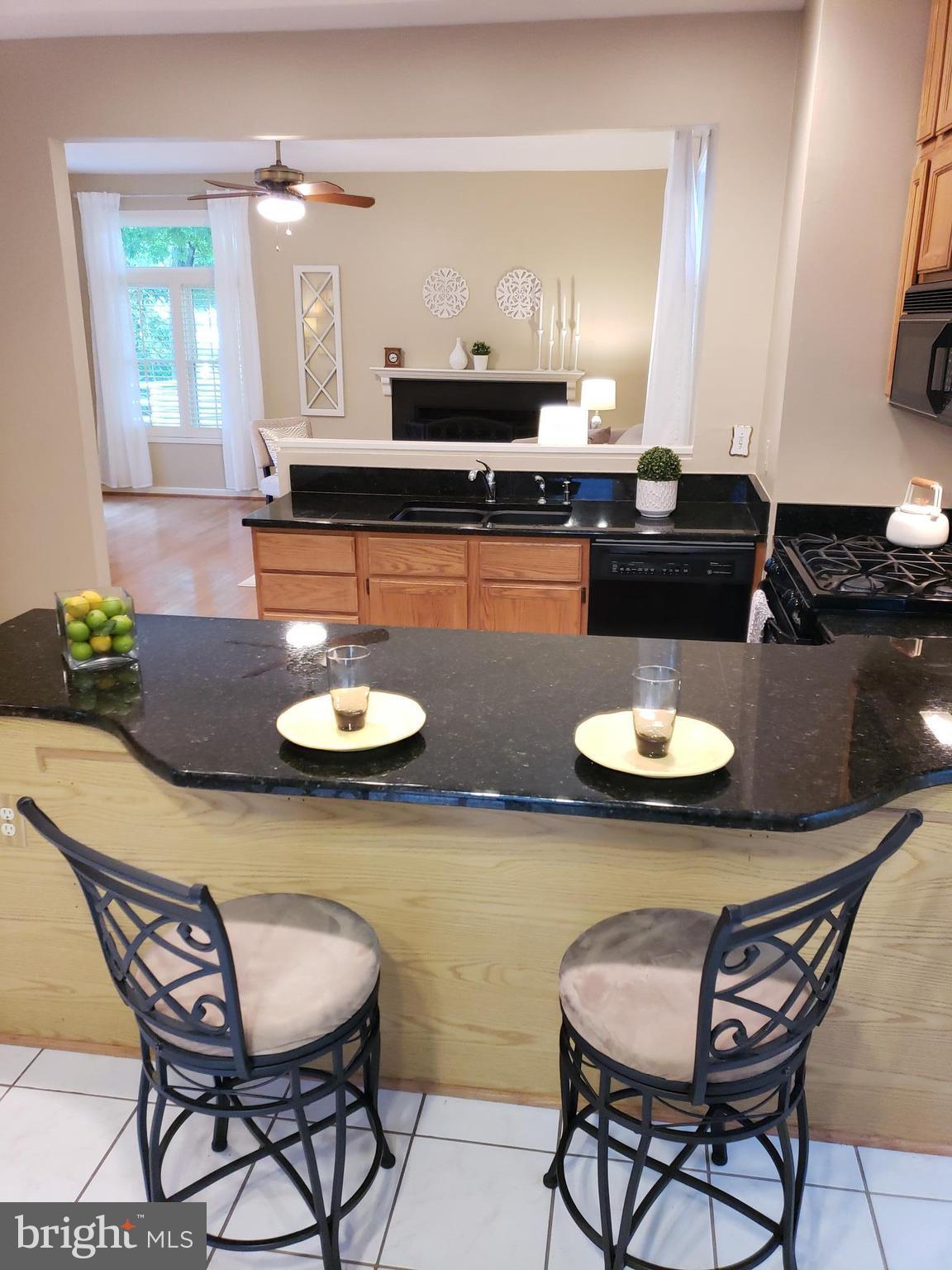 2043 Beacon Place Reston, VA 20191 - Photo 8 of 30 Kitchen view to Family Room