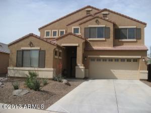 42828 West Venture Road Maricopa, AZ 85138 - Photo 6 of 6 a front view of a house with a yard