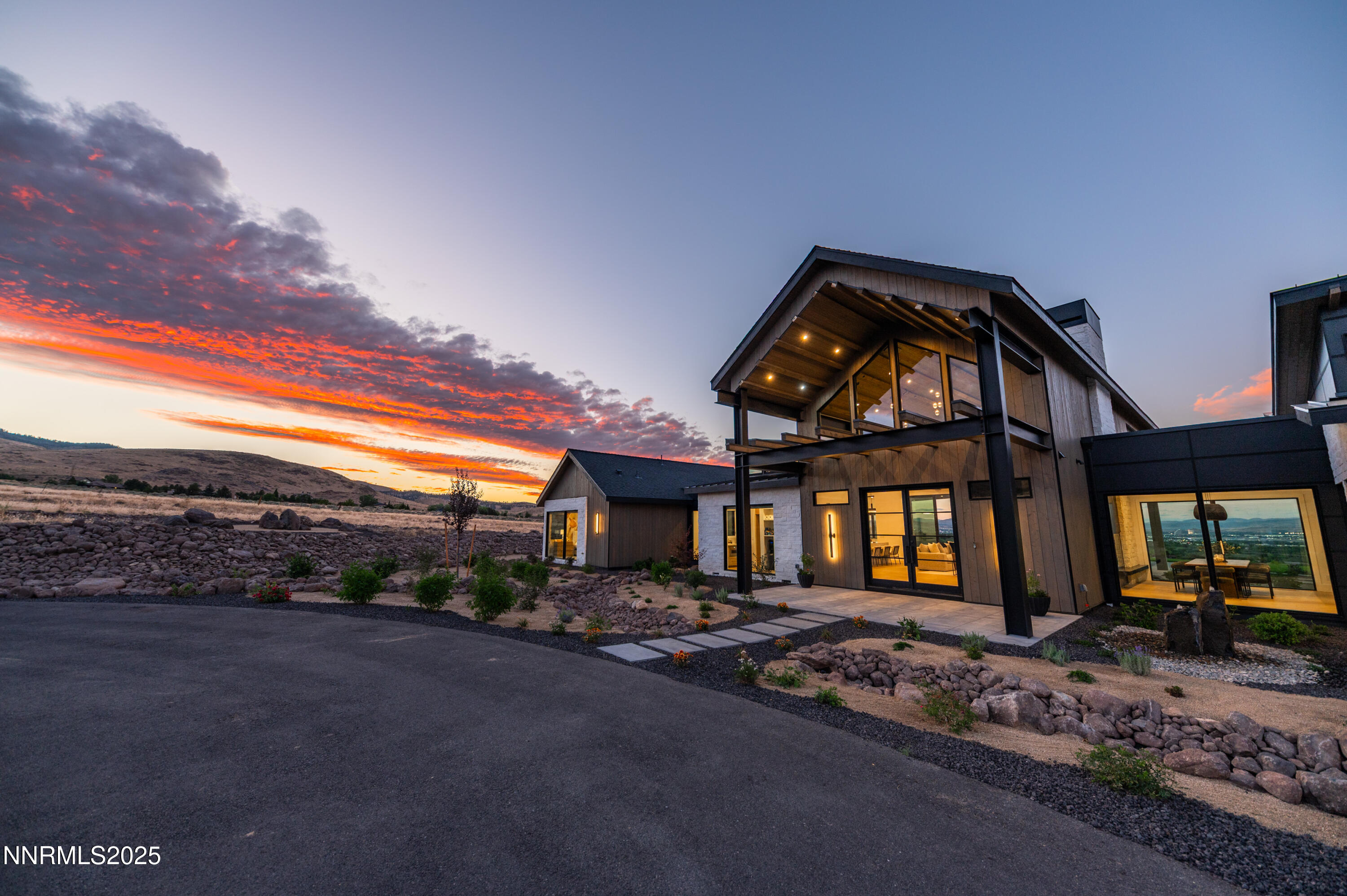 9025 Brady Ranch Road Reno, NV 89511 - Photo 2 of 42 a front view of a house with a yard
