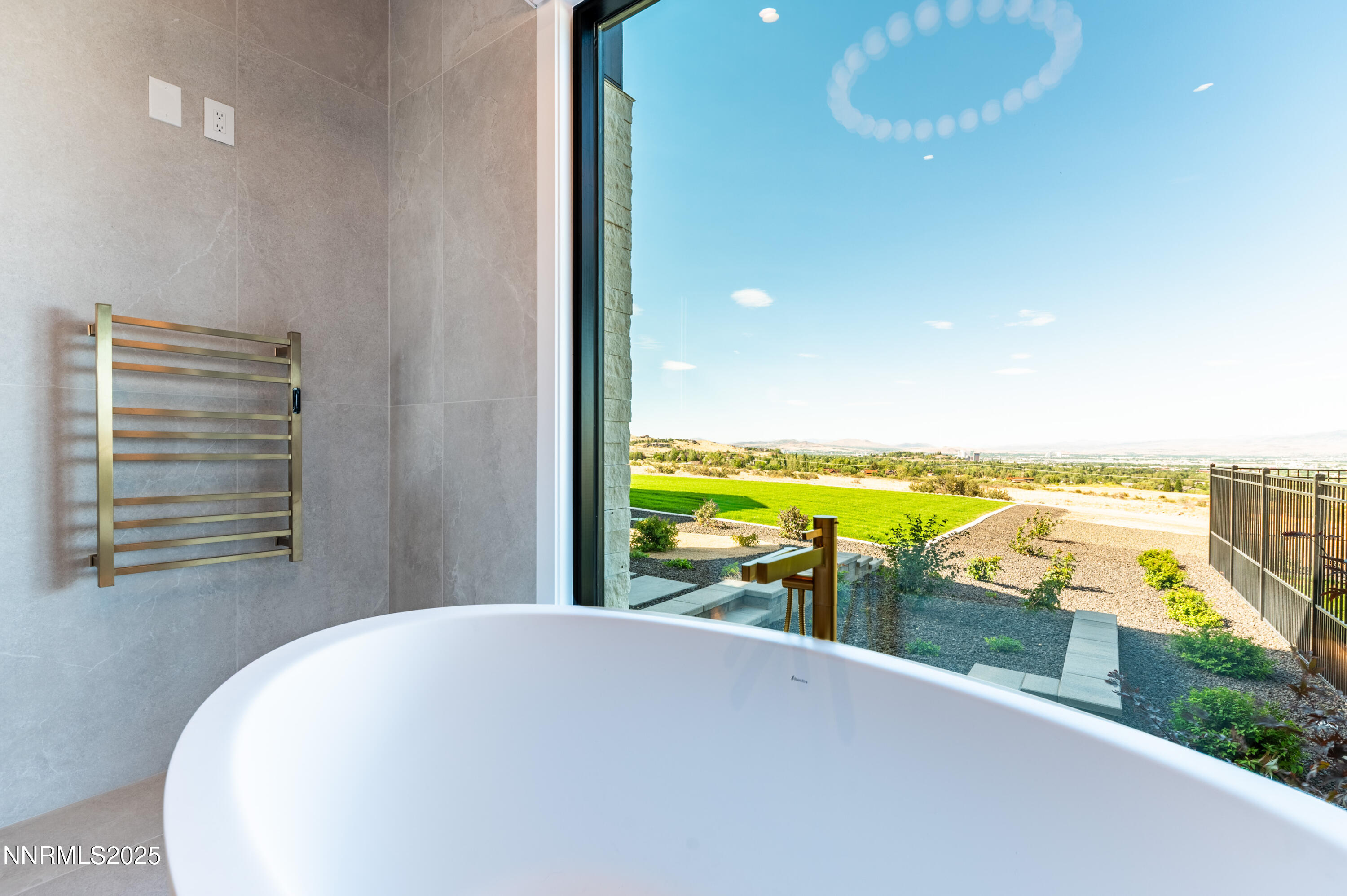 9025 Brady Ranch Road Reno, NV 89511 - Photo 22 of 42 a view of a swimming pool and an ocean view