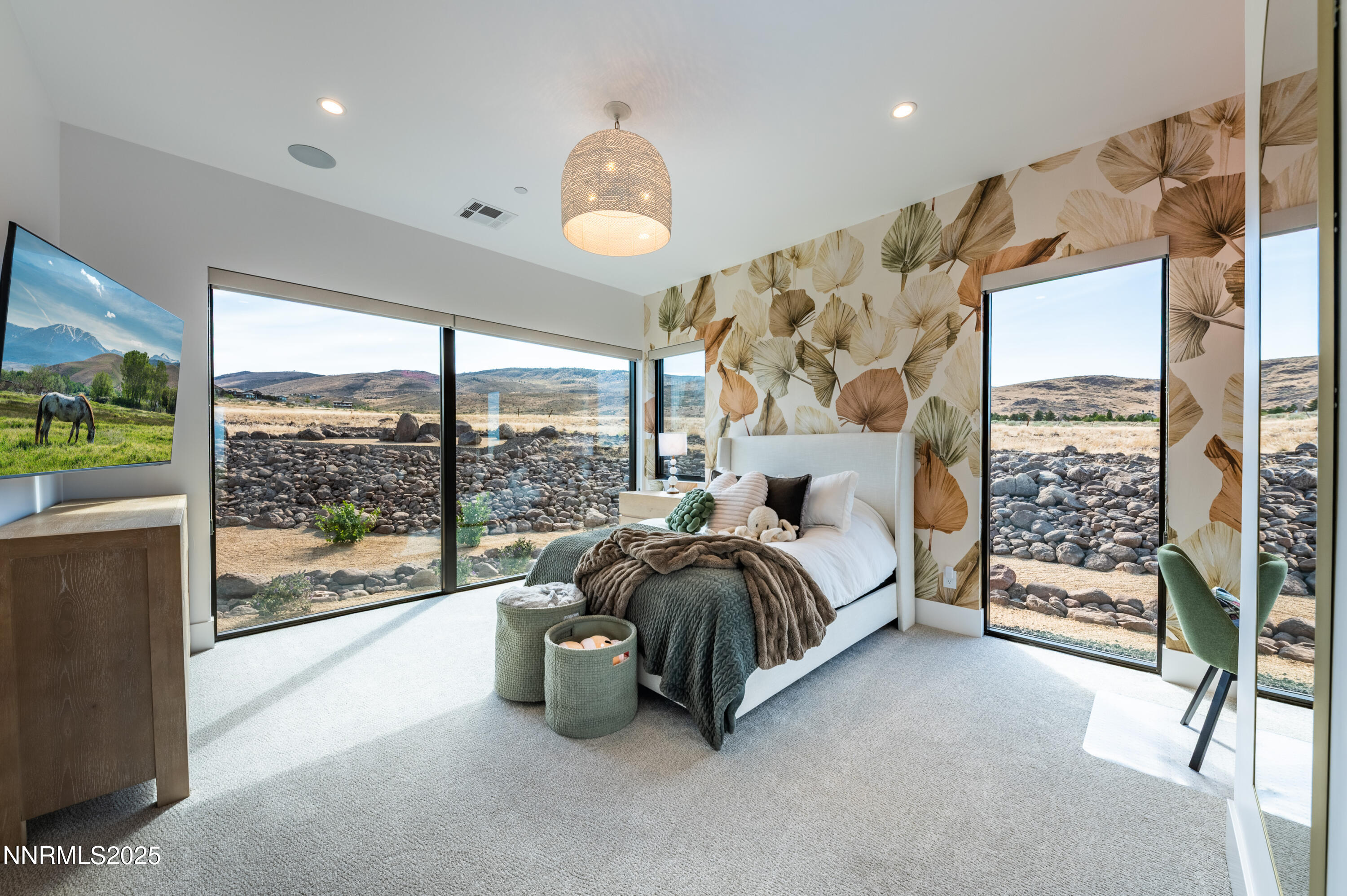 9025 Brady Ranch Road Reno, NV 89511 - Photo 24 of 42 a spacious bedroom with a bed and large window