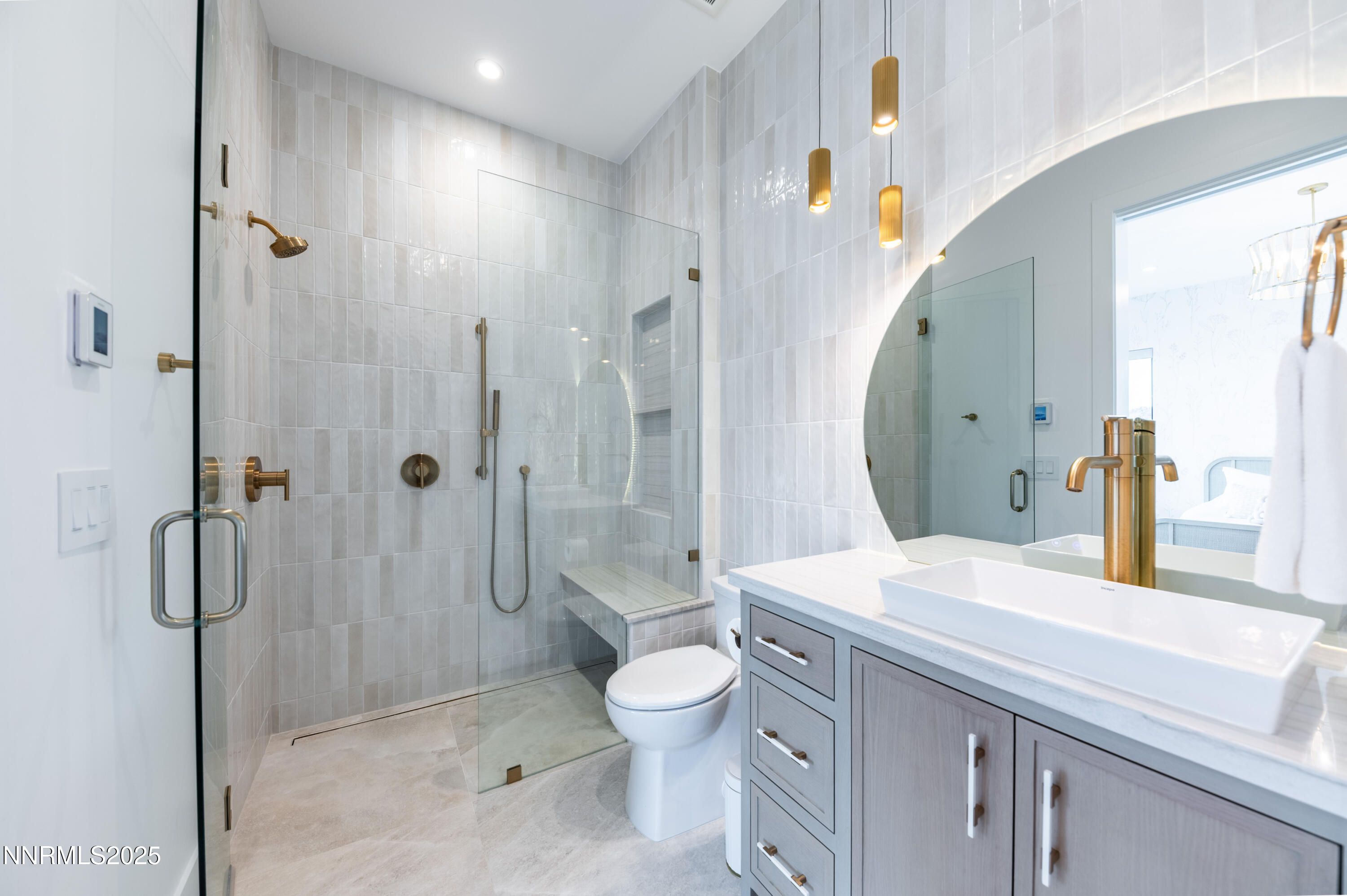 9025 Brady Ranch Road Reno, NV 89511 - Photo 25 of 42 a spacious bathroom with a granite countertop sink a toilet and shower