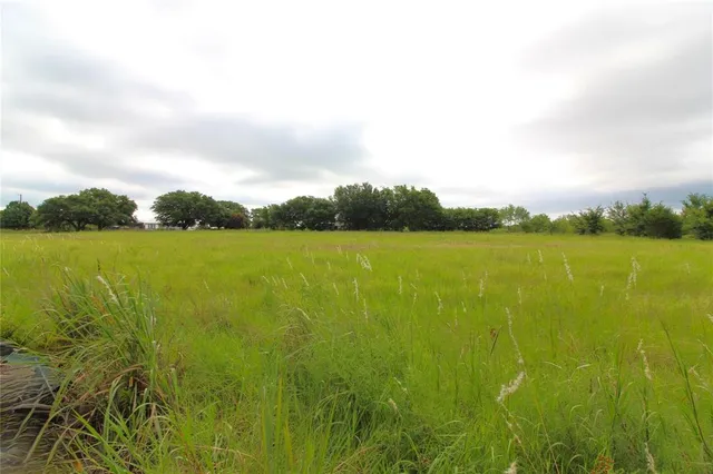 a view of a lake with a big yard